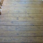 Those darker floorboards blend right in now after cleaning, brightening, and staining (2 coats wet-in-wet).